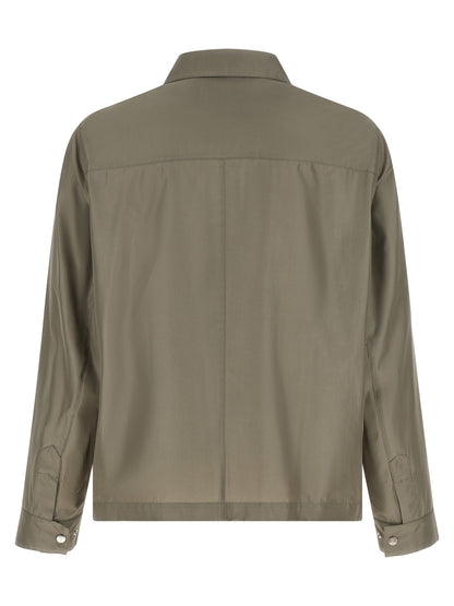 Overcoat by Brunello Cucinelli for men in polyurethane & silk bicolour & green features a contemporary silhouette showcasing a contemporary and refined pockets for a sophisticated finish.