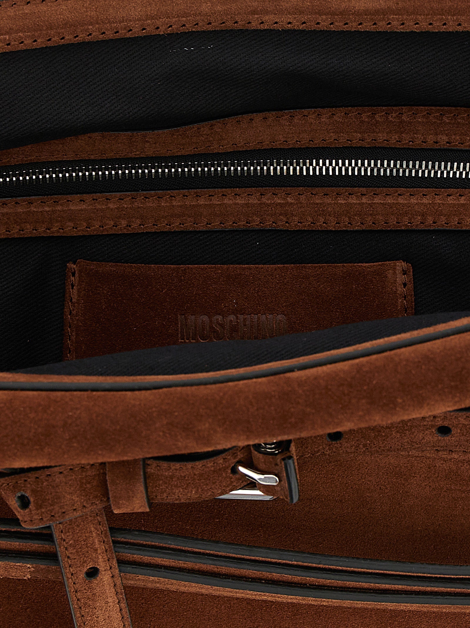 Shoulder Clutch Handbag by Moschino for women in suede calfskin leather brown & silver features a architectural silhouette, showcasing a secure zipper & buckle, ample , and versatile shoulder-strap & adjustable-strap for a architectural finish.
