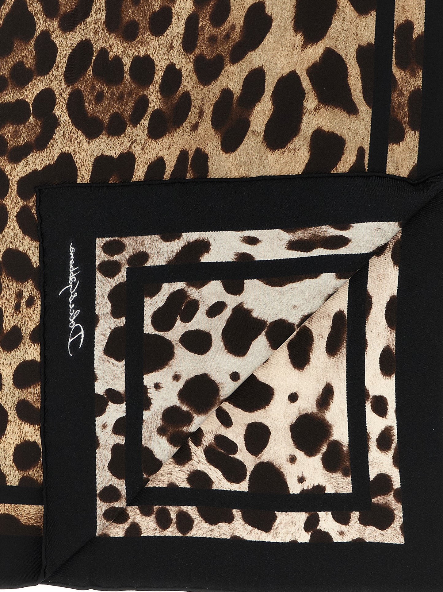 Scarf by Dolce & Gabbana for women in silk black, brown, white, leopard-print, signature & print features a timeless silhouette, artfully capturing the essence of the timeless Silk Scarf design for a sophisticated look.