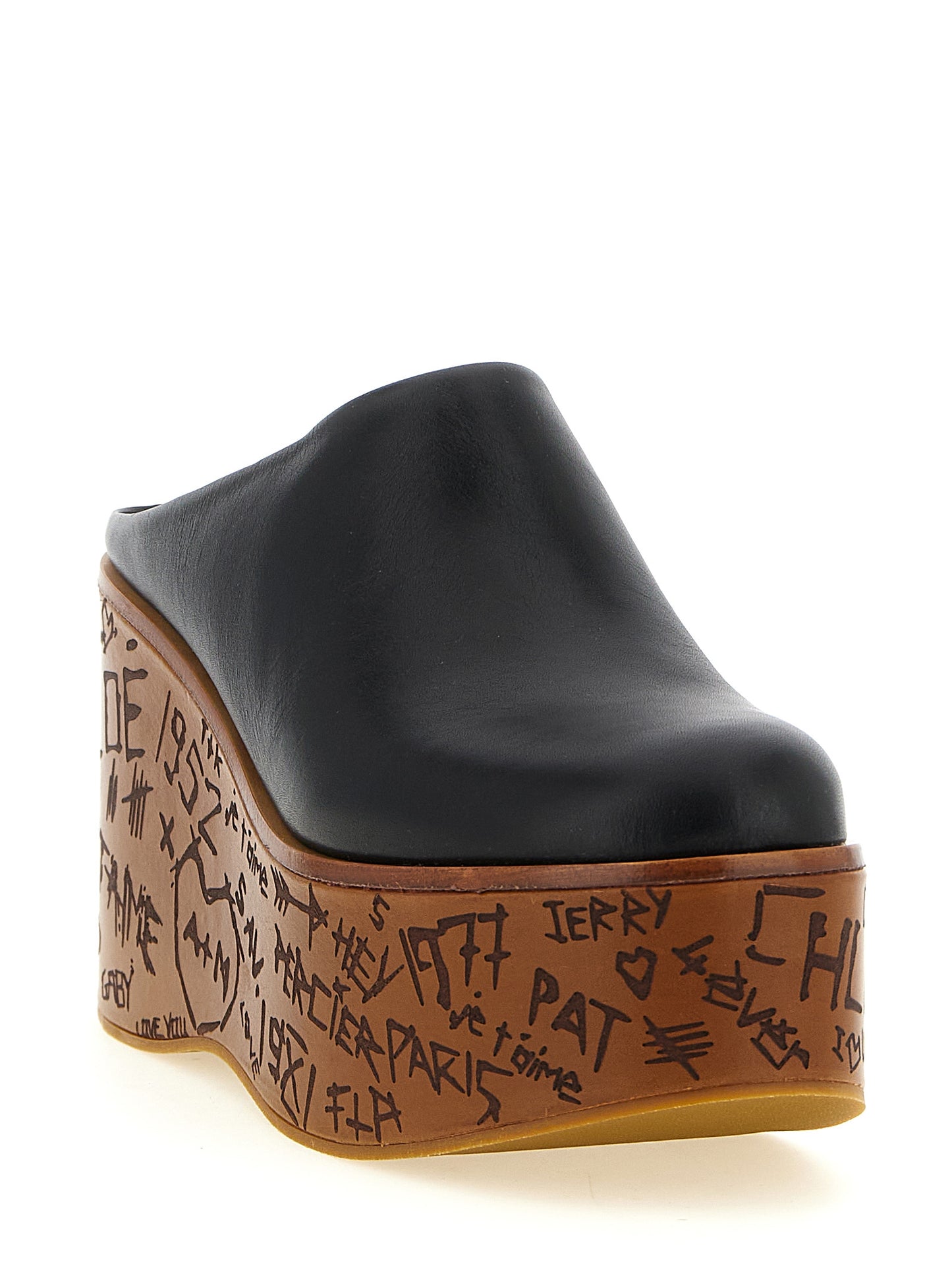 Wedge Sandals by Chloé for women in wood & calfskin leather black features an effortlessly chic silhouette from the Aren Women's Wood & Calfskin Leather Wedge Sandals collection, showcasing a effortlessly chic wedge and elegant .