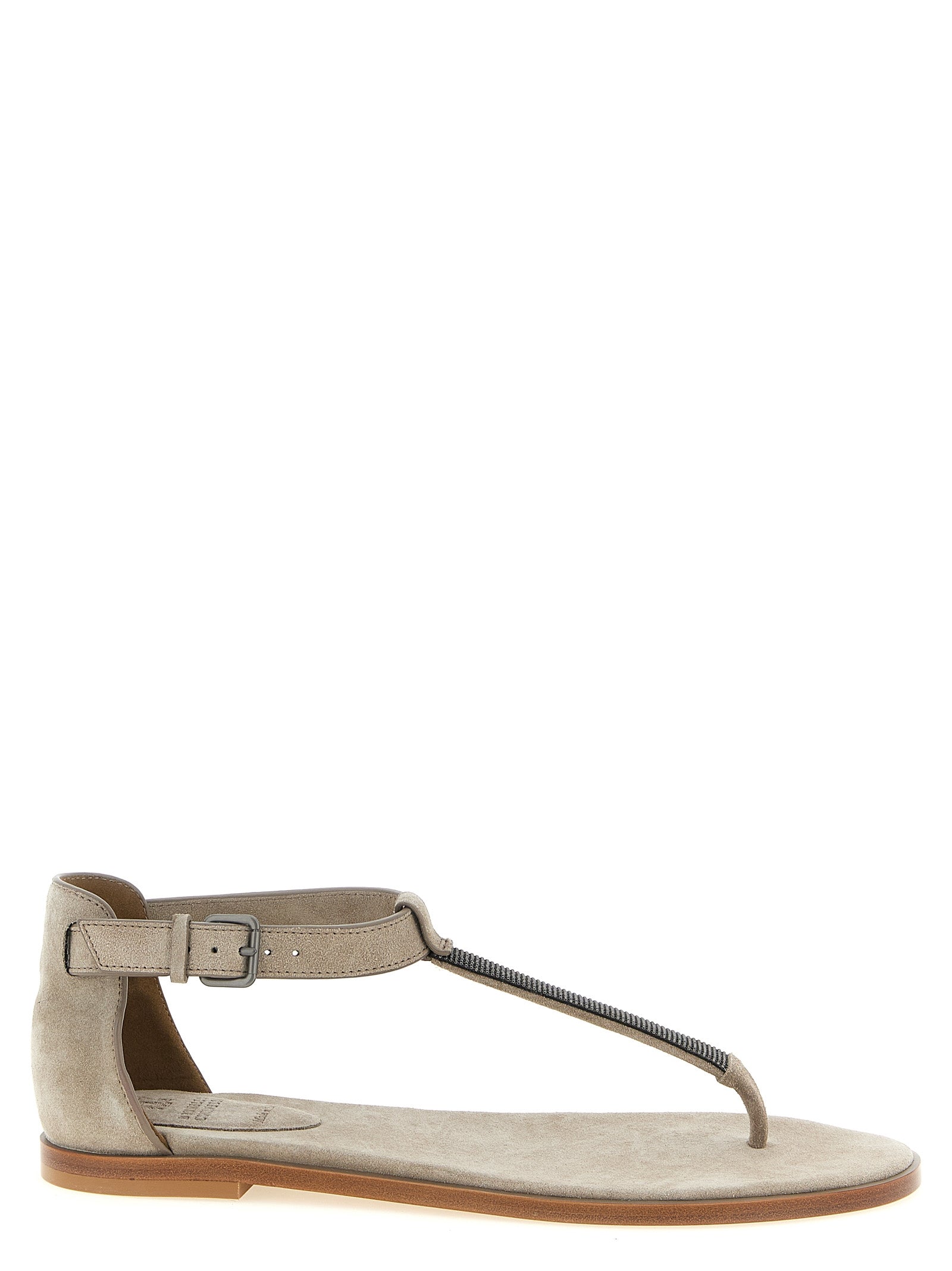 Flat Ankle Strap T-Strap Sandals by Brunello Cucinelli for women in suede calfskin leather beige, gray & signature features an statuesque Monile Women's Suede Calfskin Leather Flat Ankle Strap T-Strap Sandals silhouette with a refined flat and elegant .