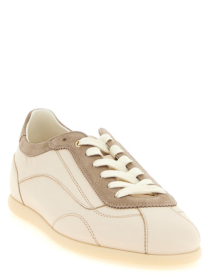 Sneakers by Brunello Cucinelli for men in suede calfskin leather & cotton beige & gold presents a sumptuous silhouette, artfully capturing the essence of the Men's Low Top Suede Calfskin Leather & Cotton Sneakers with its sumptuous low-top style design.