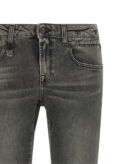 Jeans by R13 for women in stretch denim cotton black, dark-gray, gold & signature presents a tailored silhouette, showcasing a tailored bootcut and long cut with a refined low rise for a truly tailored aesthetic.