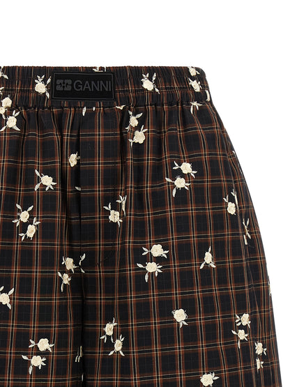 Bermuda Shorts by Ganni for women in organic cotton black, brown, white, patterned & floral presents a sleek silhouette, featuring a sleek wide with a refined short and a sophisticated .