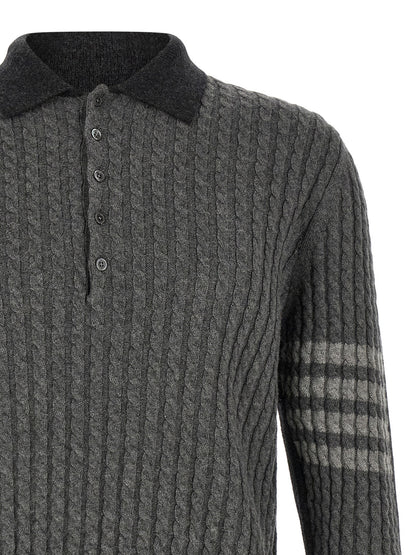 This Polo Shirt by Thom Browne for men in canvas & virgin wool dark-gray, gray & patterned presents a flawless silhouette, showcasing flawless detailing and a refined for a truly flawless aesthetic.