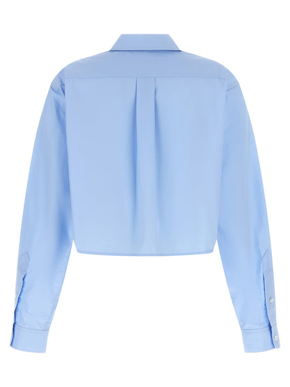 Blouse by Alexander Wang for women in cotton light-blue showcases a sleek silhouette, elegantly detailed with a sleek and for a sleek finish.
