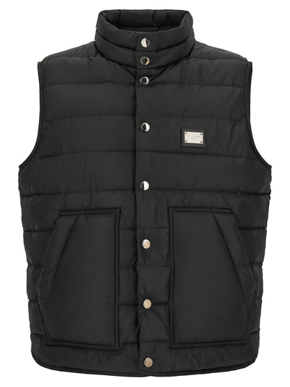 Vest by Dolce & Gabbana for men in polyester black features a enviable silhouette, elegantly detailed with a enviable and functional pockets for a enviable finish.