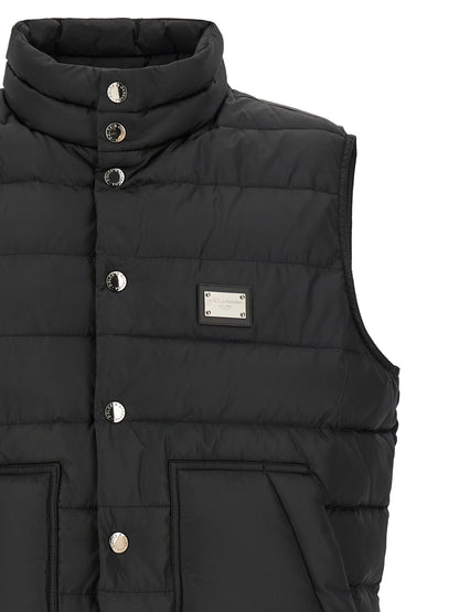 Vest by Dolce & Gabbana for men in polyester black showcases a utilitarian silhouette, artfully incorporating pockets and a utilitarian for a truly utilitarian finish.