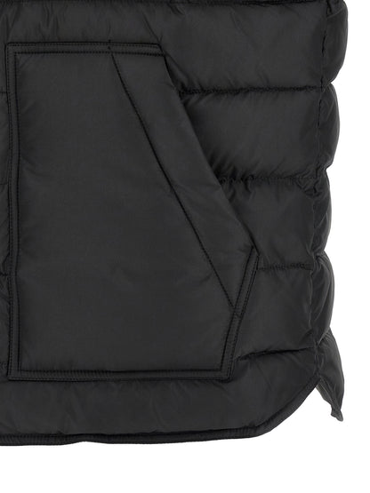 Vest by Dolce & Gabbana for men in polyester black showcases a dynamic silhouette, perfectly balancing pockets with a dynamic for a sophisticated, high-fashion look.