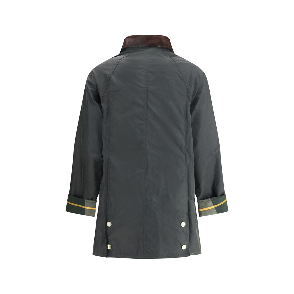 Jacket by Barbour for women in cotton bicolour & tartan showcases a contemporary silhouette, detailed with a contemporary round neckline and premium pockets for a sophisticated finish.
