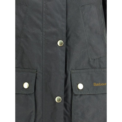 Jacket by Barbour for women in cotton bicolour & tartan presents a impeccable silhouette, showcasing distinct pockets and a impeccable round neckline for a sophisticated finish.