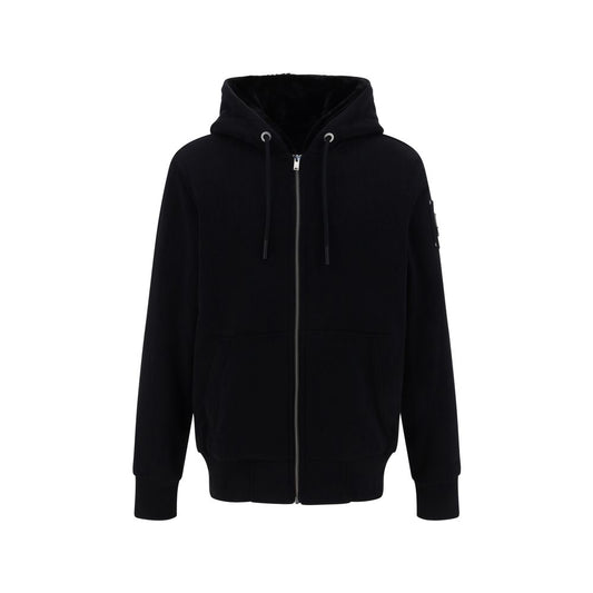 Sweatshirt Hoodie by Moose Knuckles for men in polyester cotton & fur black & monogram features a edgy silhouette, detailed with a edgy hooded neckline and for a refined finish.