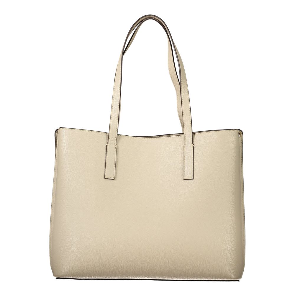 This Handbag by Guess Jeans for women in polyurethane and beige presents a sculptural silhouette featuring a secure snap & zipper, ample built-in-compartments & internal-pockets, and versatile handle for a sculptural finish.