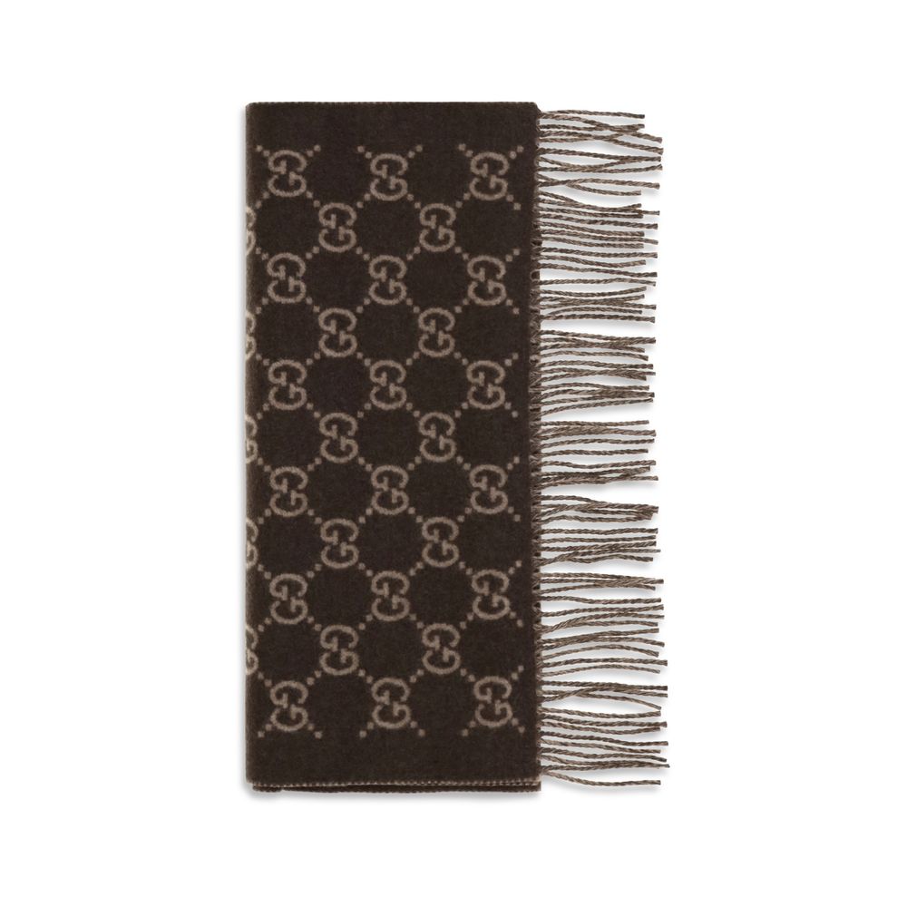 Scarf by Gucci for men in cashmere & capra leather brown & patterned presents a effortlessly chic silhouette, artfully capturing the essence of the effortlessly chic Gg Cashmere & Capra Leather Fringes Scarf design for a sophisticated look.