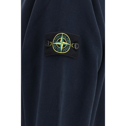 Sweatshirt Hoodie by Stone Island for men in cotton blue & signature features an avant-garde silhouette, showcasing a sophisticated hooded high-neck neckline and detail for a truly avant-garde finish.
