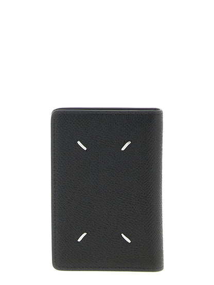 Cardholder Card Case by Maison Margiela for unisex in calfskin leather black features a sleek silhouette, showcasing the sleek design of the Calfskin Leather Cardholder Card Case with functional card-organization for a premium look.
