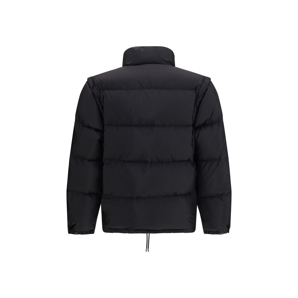 Puffer Jacket by Prada for men in nylon & goose down black features an contemporary silhouette, showcasing a sophisticated high-neck neckline and contemporary pockets & insulated for a truly refined look.