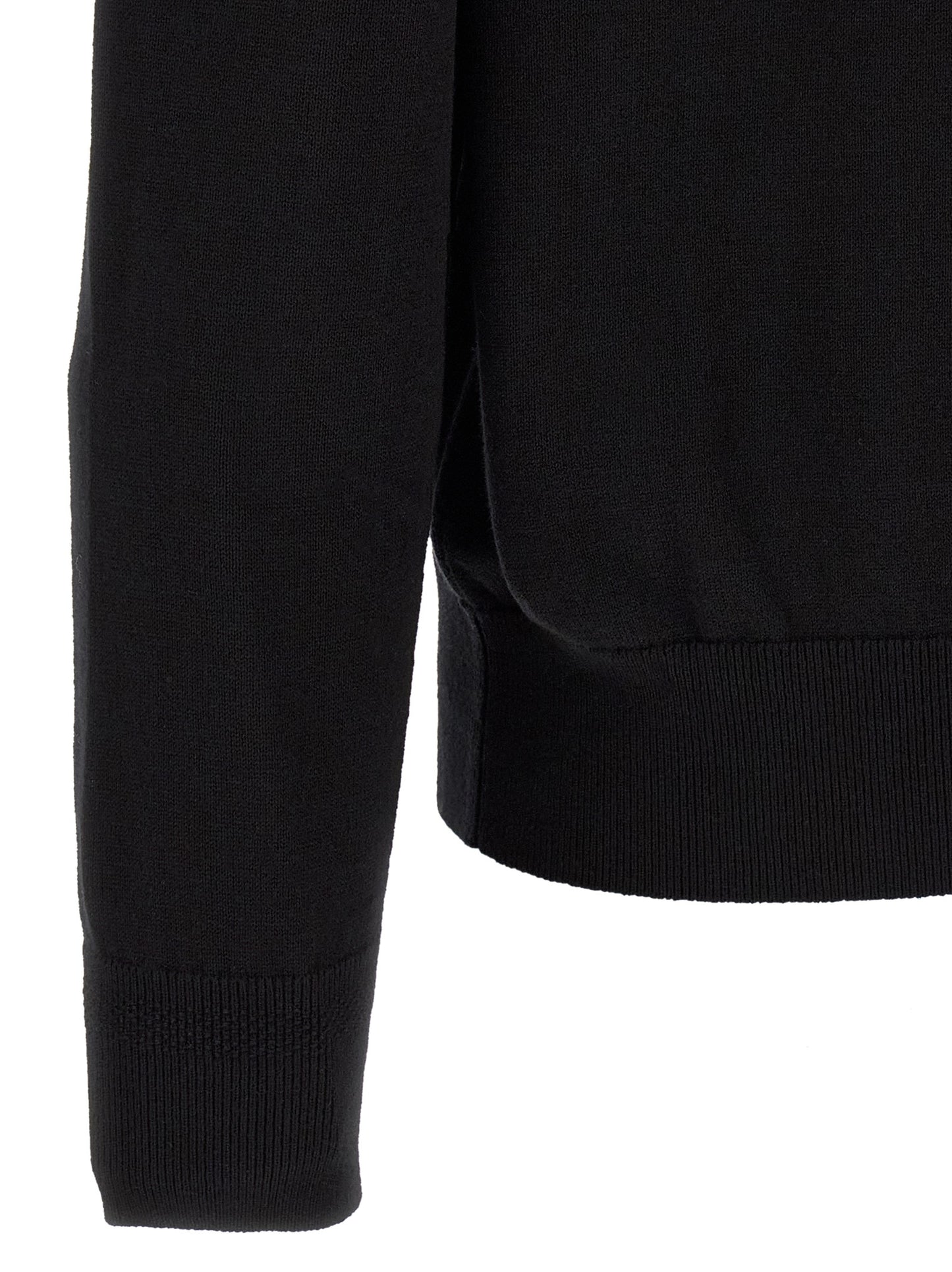 Cardigan by Hugo Boss for men in cashmere cotton blend black showcases a captivating silhouette, artfully detailed with a captivating and for a truly sophisticated captivating look.