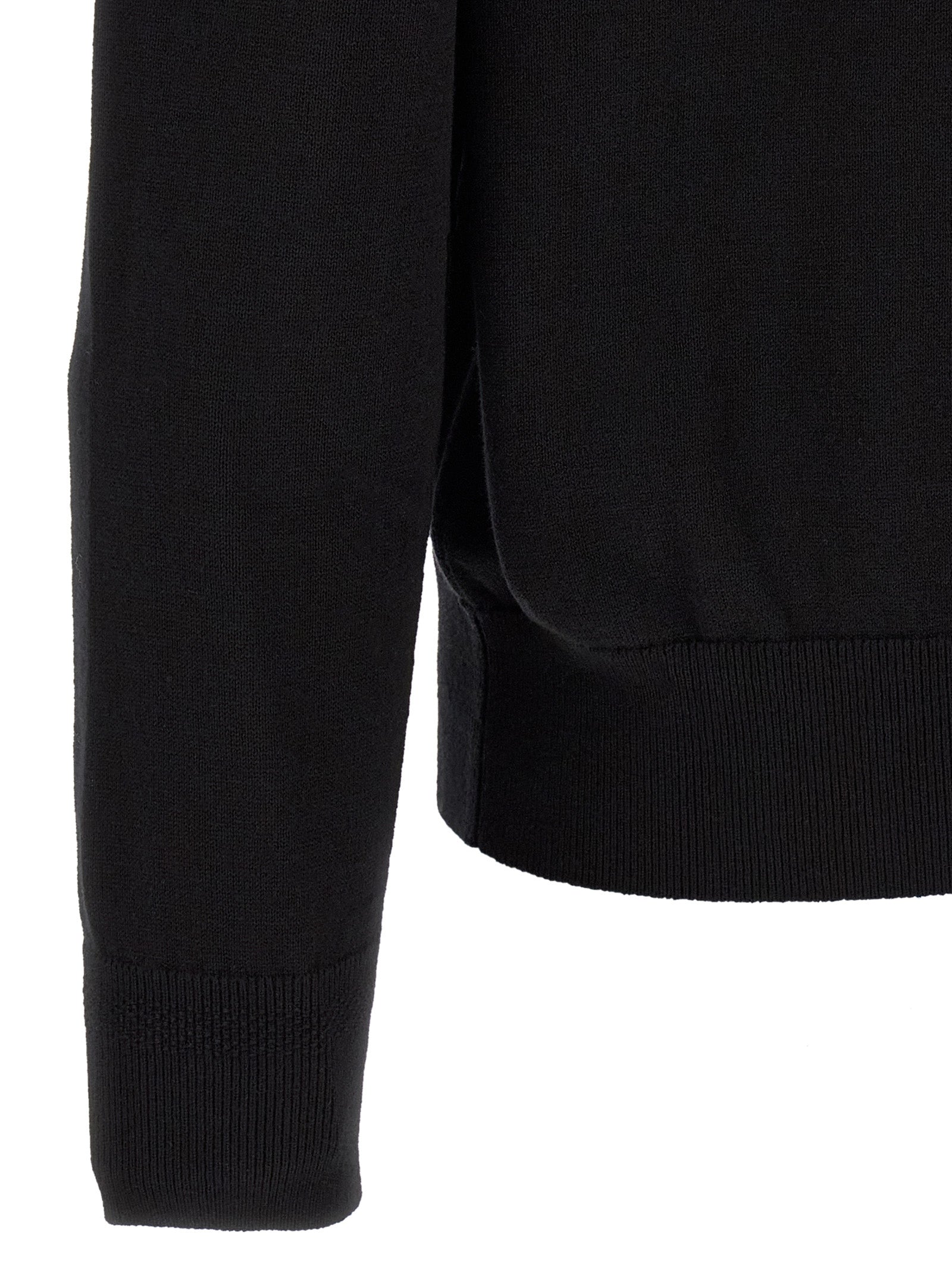 Cardigan by Hugo Boss for men in cashmere cotton blend black showcases a captivating silhouette, artfully detailed with a captivating and for a truly sophisticated captivating look.