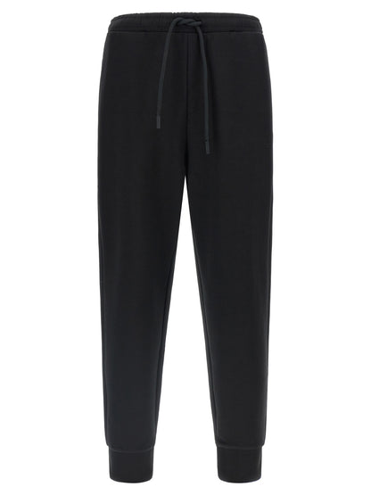 Joggers by Hugo Boss for men in stretch cotton black presents a refined pantology silhouette, artfully defined by a refined pantology , long, and a sophisticated .