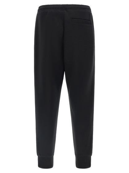 Joggers by Hugo Boss for men in stretch cotton black features an sophisticated and with a precise long, creating a sophisticated and sophisticated silhouette.