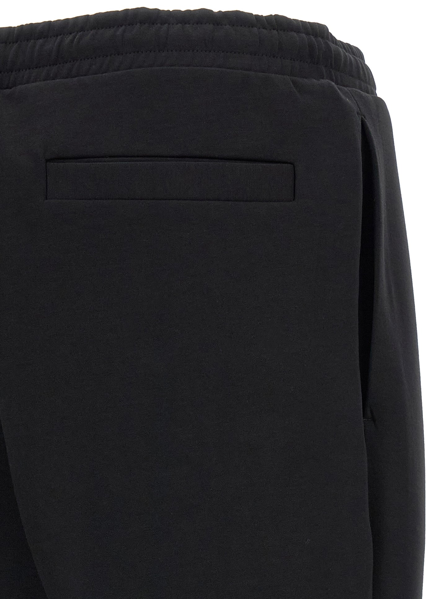 Joggers by Hugo Boss for men in stretch cotton black features an refined tailoring silhouette, showcasing a premium with a and long cut for a refined tailoring look.
