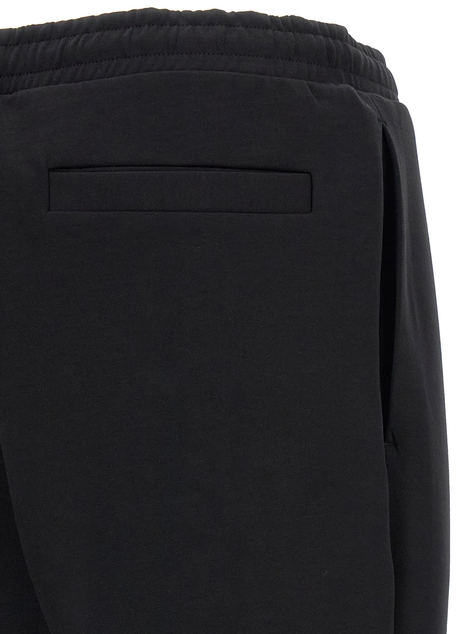 Joggers by Hugo Boss for men in stretch cotton black features an refined tailoring silhouette, showcasing a premium with a and long cut for a refined tailoring look.