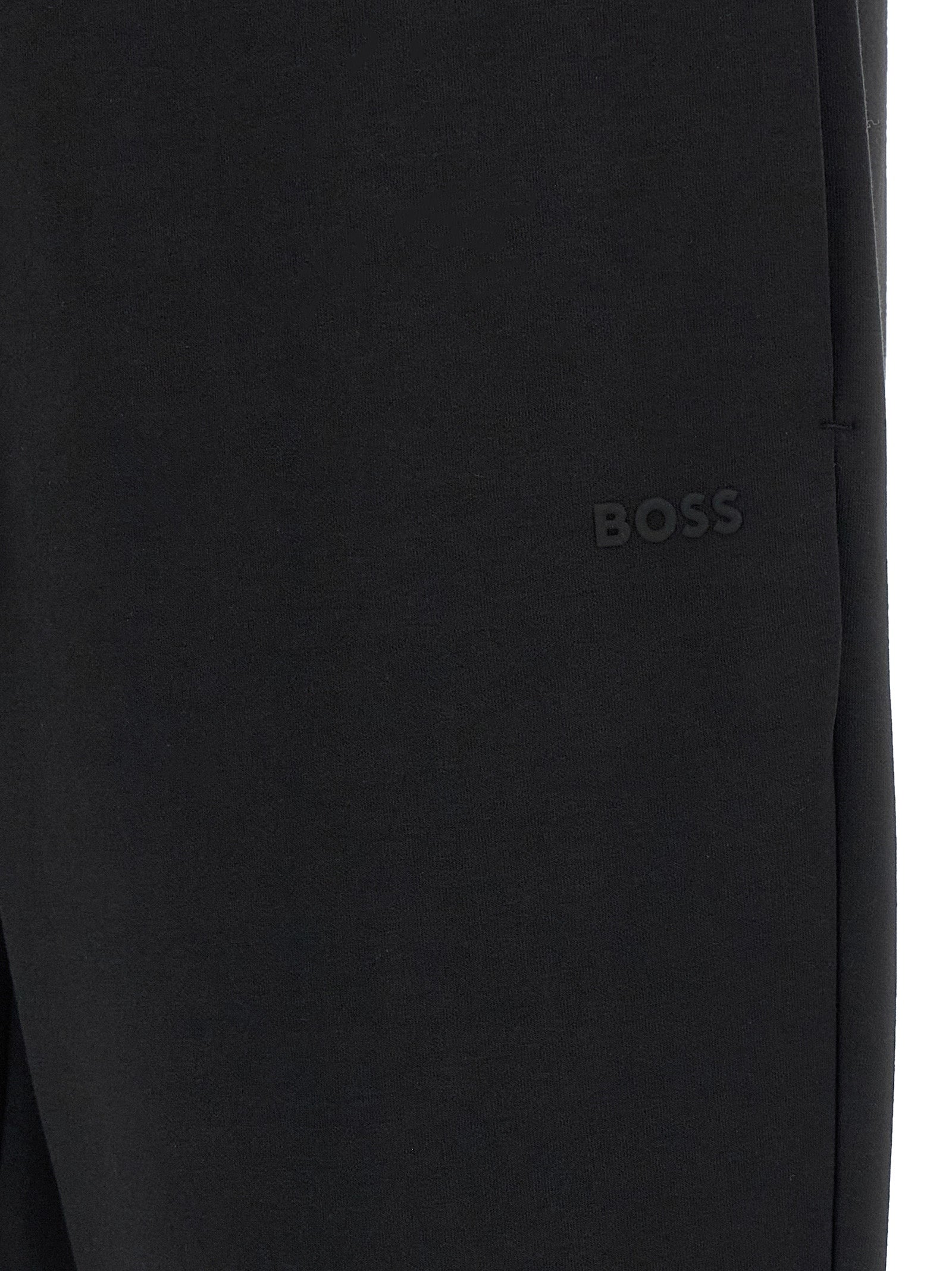 Joggers by Hugo Boss for men in stretch cotton black features an sartorial and long with a cut for a sartorial finish.