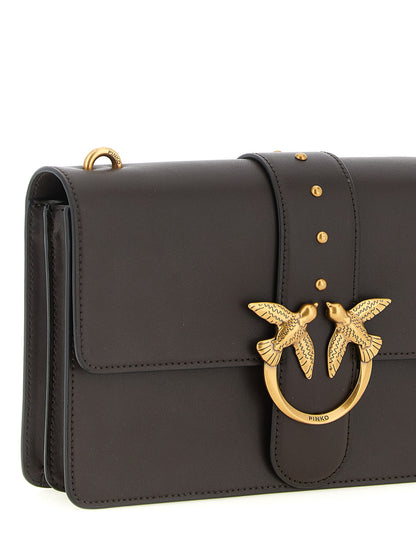 Crossbody Flap Handbag by PINKO for women in canvas & calfskin leather brown & gold features an multi-faceted design with a secure flap & buckle, ample , and versatile crossbody-strap, shoulder-strap & adjustable-strap for a multi-faceted finish.