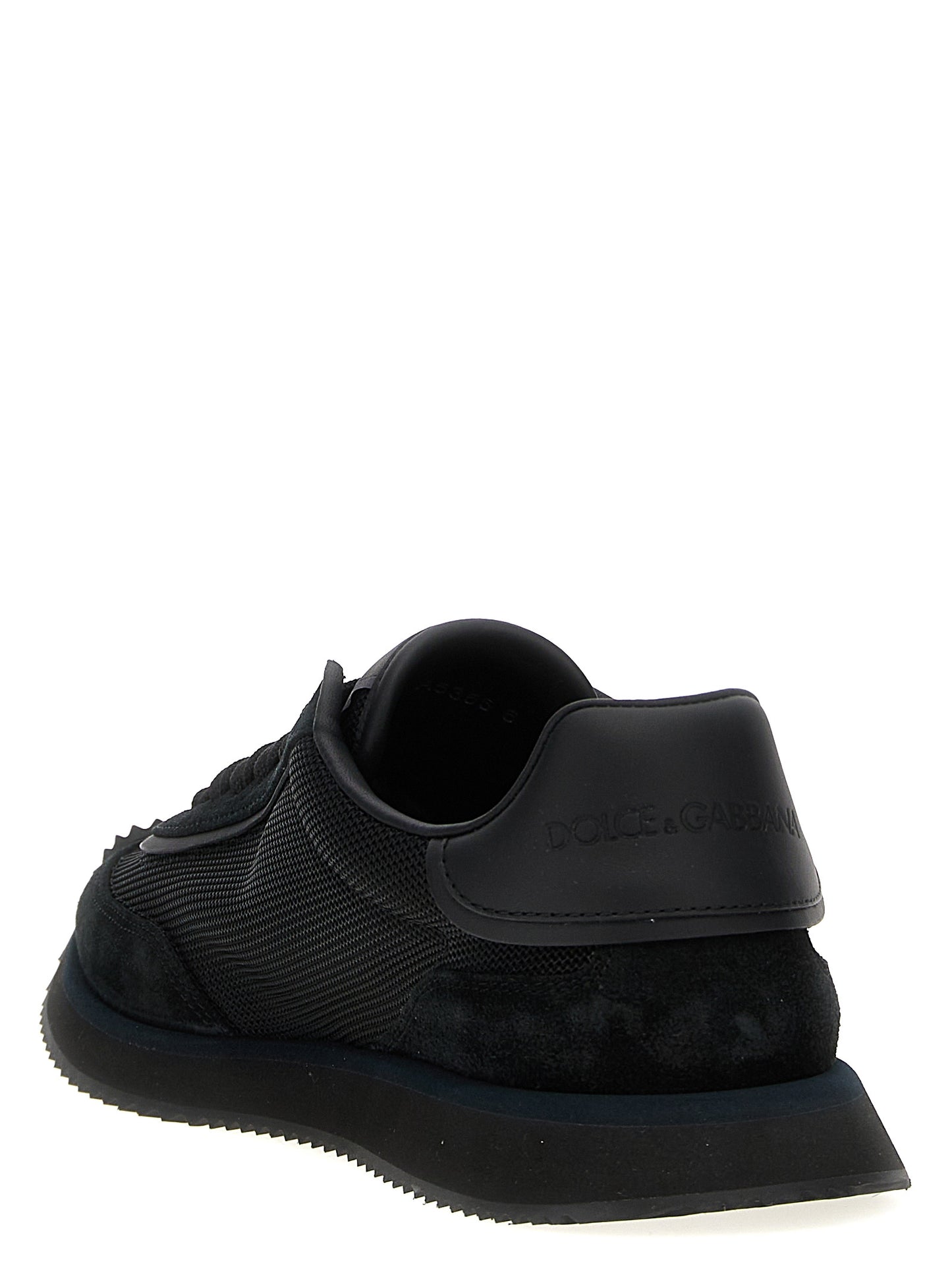 Athletic Sneakers by Dolce & Gabbana for men in suede calfskin leather & polyester black presents a sleek silhouette, perfectly capturing the athletic style essence of Men's Athletic Suede Calfskin Leather & Polyester Sneakers with its sleek design and premium finish.