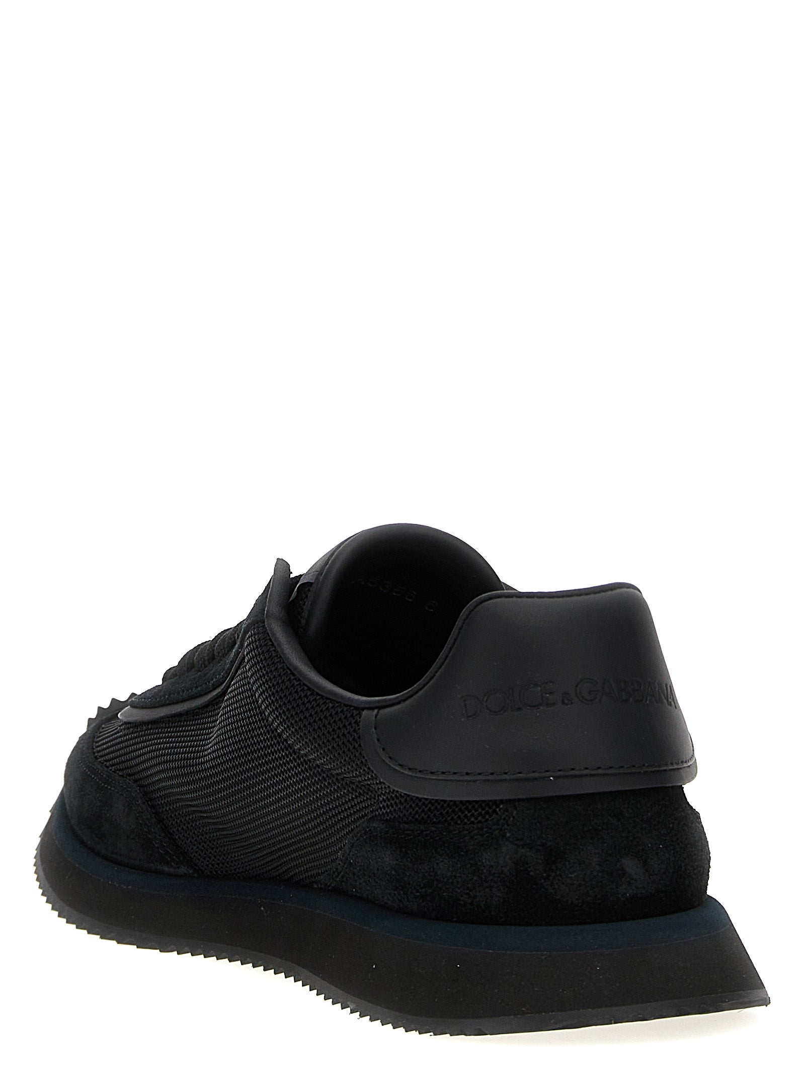 Athletic Sneakers by Dolce & Gabbana for men in suede calfskin leather & polyester black presents a sleek silhouette, perfectly capturing the athletic style essence of Men's Athletic Suede Calfskin Leather & Polyester Sneakers with its sleek design and premium finish.