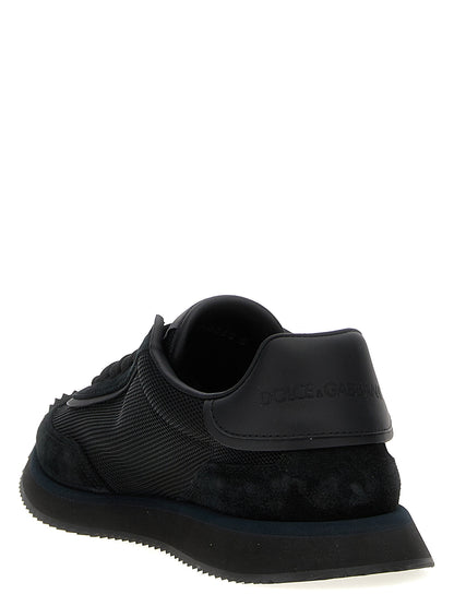 Athletic Sneakers by Dolce & Gabbana for men in suede calfskin leather & polyester black presents a sleek silhouette, perfectly capturing the athletic style essence of Men's Athletic Suede Calfskin Leather & Polyester Sneakers with its sleek design and premium finish.