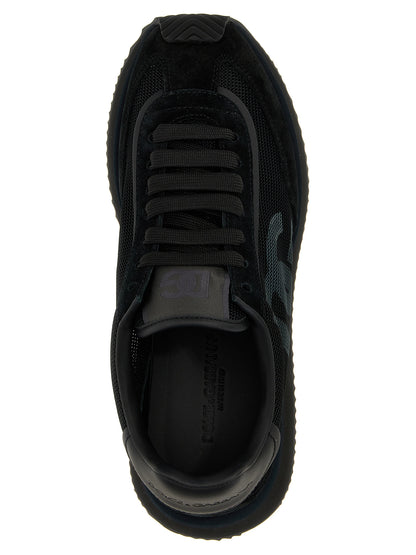 Athletic Sneakers by Dolce & Gabbana for men in suede calfskin leather & polyester black showcases an impeccable silhouette, defined by an impeccable athletic style design that perfectly captures the essence of the Men's Athletic Suede Calfskin Leather & Polyester Sneakers.