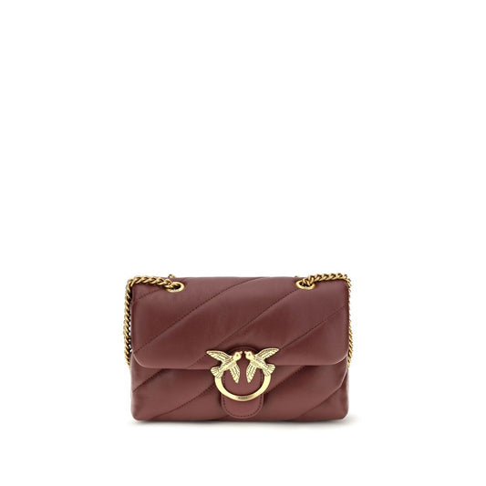 Mini 2-in-1 Shoulder & Crossbody Quilted Bag by PINKO for women in bos taurus calf leather bordeaux, gold & monogram features an effortlessly chic silhouette with a secure magnetic & button, ample , and versatile crossbody-strap & shoulder-strap for effortlessly chic everyday luxury.