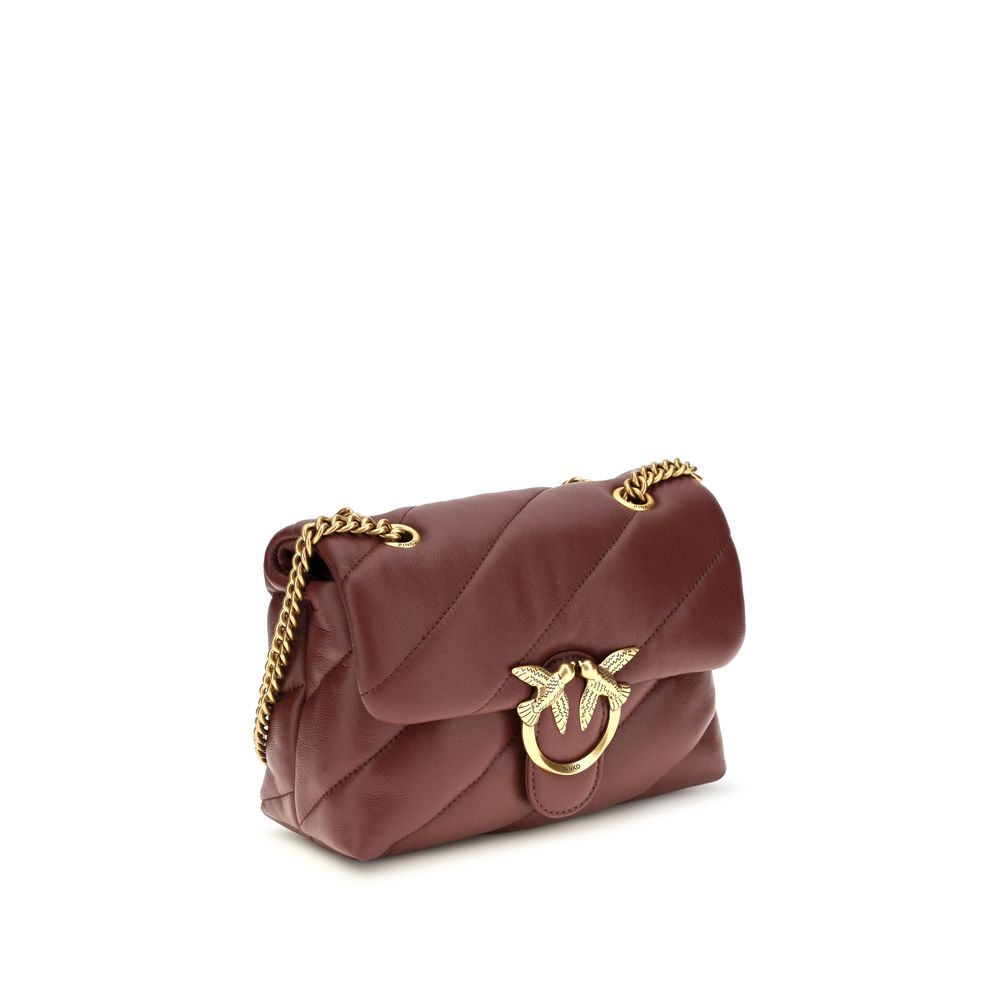 Mini 2-in-1 Shoulder & Crossbody Quilted Bag by PINKO for women in bos taurus calf leather bordeaux, gold & monogram presents a versatile silhouette, showcasing a secure magnetic & button and versatile with versatile crossbody-strap & shoulder-strap for a sophisticated look.