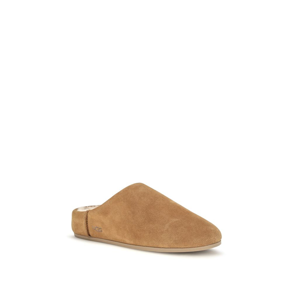 Mules Slippers Flat Shoes by UGG for women in suede leather & rubber beige & signature showcases a enchanting silhouette as part of the Women's Suede Leather & Rubber Mules Slippers Flat Shoes collection, defined by a enchanting and for a enchanting look.