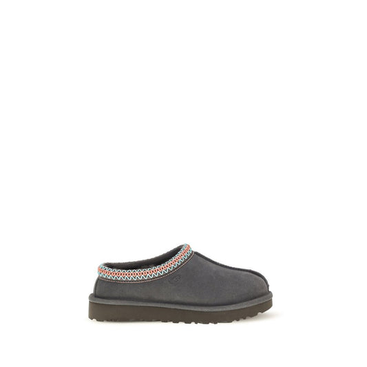 Mules Flat Shoes by UGG for women in eva polyester suede leather gray & signature showcases a dynamic silhouette, artfully capturing Women's EVA Polyester Suede Leather Mules Flat Shoes through its distinctive and elegant .