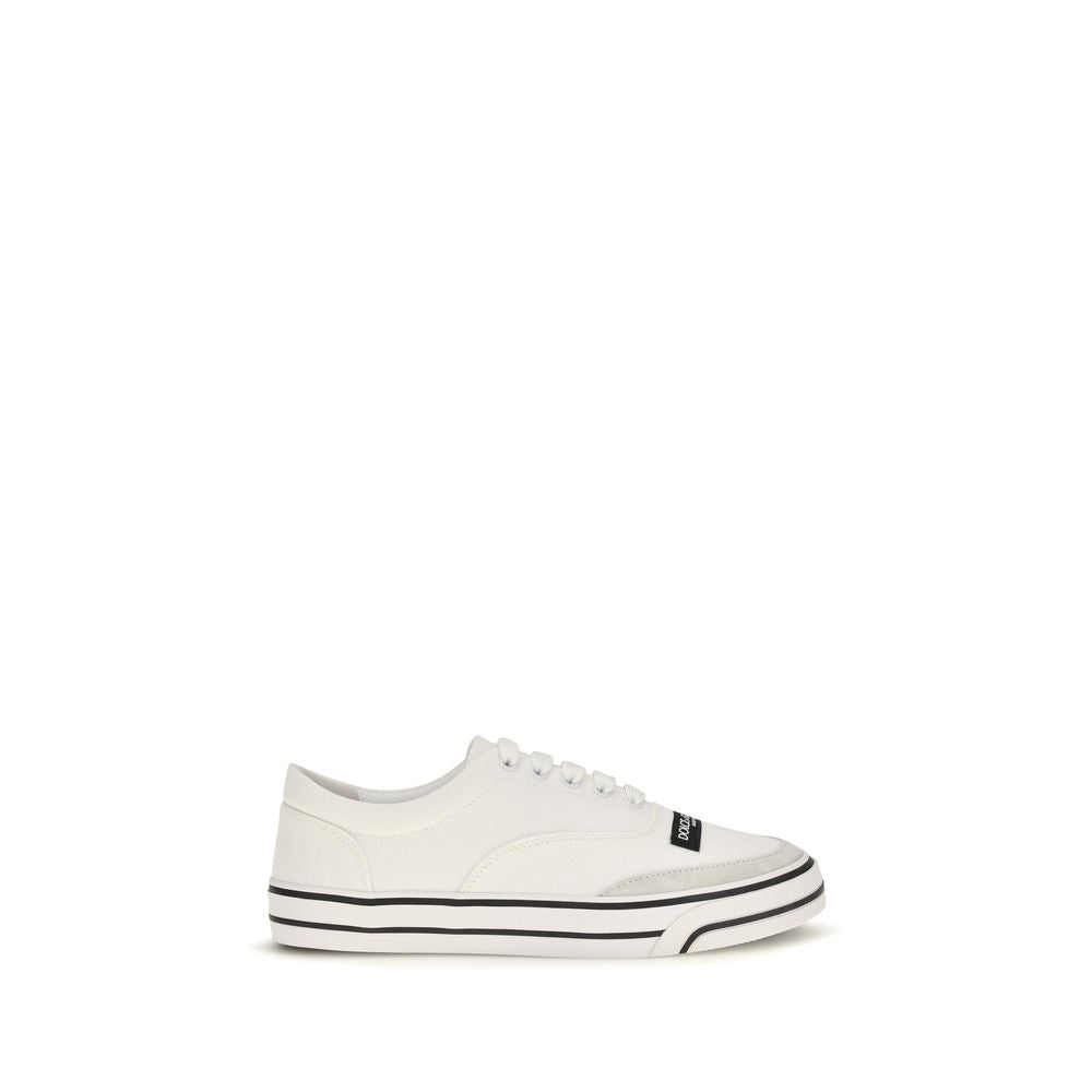 Sneakers by Dolce & Gabbana for women in cotton canvas & bos taurus calf leather cream & white presents a sumptuous silhouette, artfully capturing the essence of the Women's Low Top Cotton Canvas & Bos Taurus Calf Leather Sneakers with its sumptuous low-top style design.