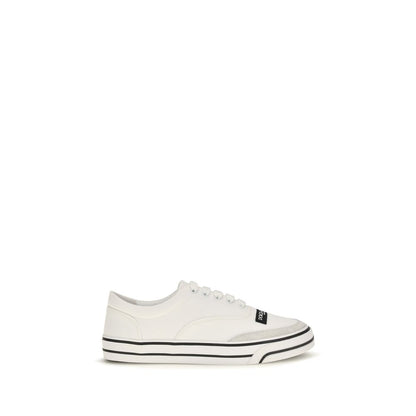 Sneakers by Dolce & Gabbana for women in cotton canvas & bos taurus calf leather cream & white presents a sumptuous silhouette, artfully capturing the essence of the Women's Low Top Cotton Canvas & Bos Taurus Calf Leather Sneakers with its sumptuous low-top style design.