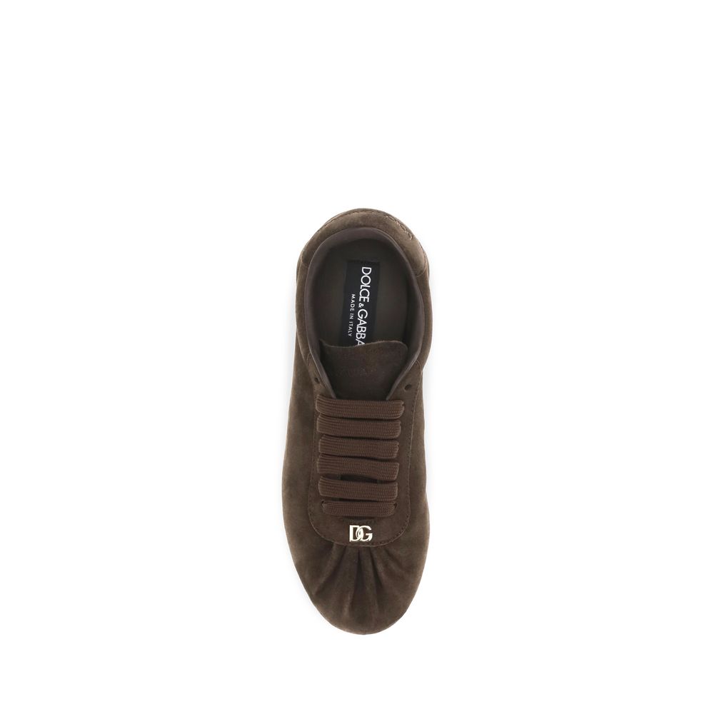 Sneakers by Dolce & Gabbana for women in suede leather brown features a chic design, perfectly showcasing the chic low-top style of this Women's Low Top Suede leather Sneakers.