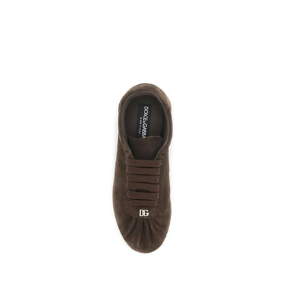 Sneakers by Dolce & Gabbana for women in suede leather brown features a chic design, perfectly showcasing the chic low-top style of this Women's Low Top Suede leather Sneakers.