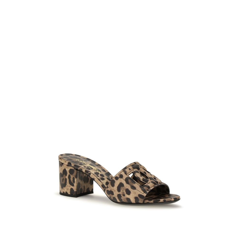 Mules Flat Shoes by Dolce & Gabbana for women in bos taurus calfskin leather beige, gold, leopard-print & print features an statuesque silhouette from the Icon Women's Bos Taurus Calfskin Leather Mules Flat Shoes collection, showcasing a and a statuesque open toe style for a statuesque look.