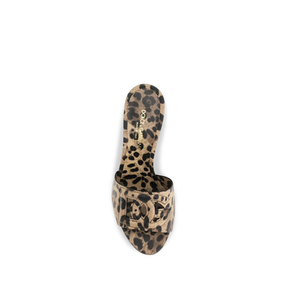 Mules Flat Shoes by Dolce & Gabbana for women in bos taurus calfskin leather beige, gold, leopard-print & print presents a effortless chic silhouette, showcasing the Icon Women's Bos Taurus Calfskin Leather Mules Flat Shoes design with a effortless chic and open toe style for a sophisticated look.