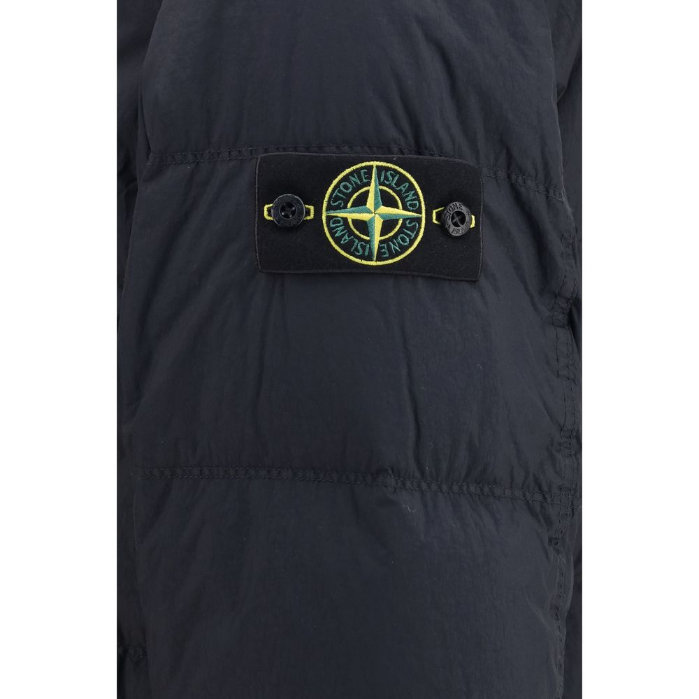Hooded Puffer Jacket by Stone Island for men in nylon resin & goose-down blue & signature features a dramatic silhouette, showcasing a sophisticated and distinctive lightweight, pockets, hooded & insulated for a dramatic aesthetic.