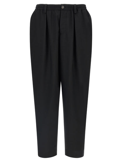 Trousers by Marni for men in virgin wool black, horn & signature presents a smart silhouette, meticulously detailed with a smart tapered-leg, relaxed-fit & cropped, a smart cropped, and a smart .