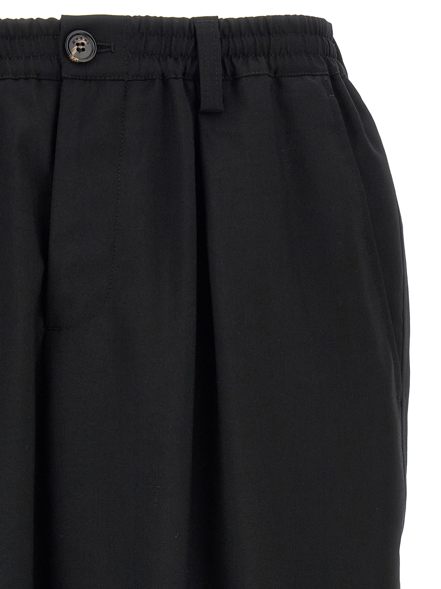 Trousers by Marni for men in virgin wool black, horn & signature features a tailored silhouette with a tailored tapered-leg, relaxed-fit & cropped, defined by its cropped and a sophisticated .
