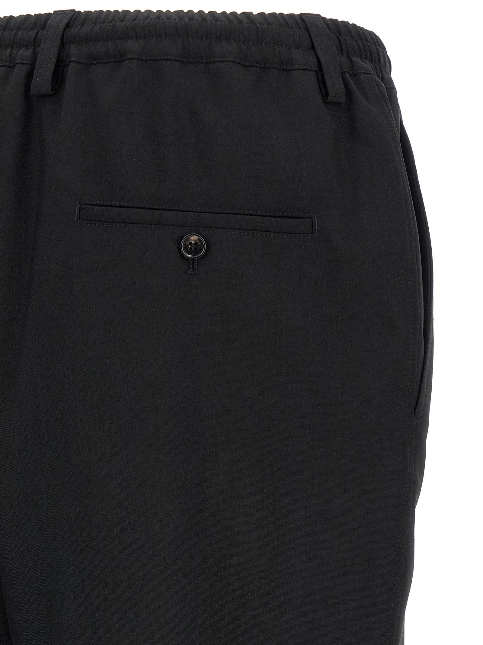 Trousers by Marni for men in virgin wool black, horn & signature presents a smart silhouette, meticulously detailed with a smart tapered-leg, relaxed-fit & cropped, a smart cropped, and a smart .