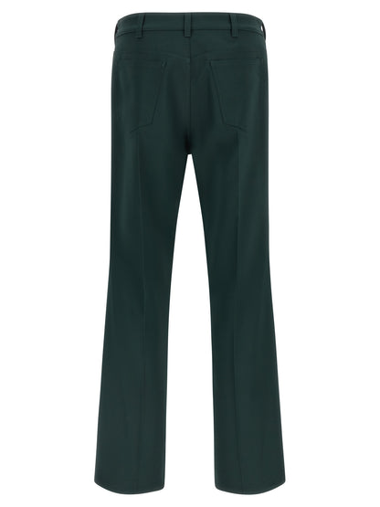 Trousers by Marni for men in polyester twill bicolour & dark-green presents a perennial silhouette, meticulously tailored with a straight-leg & flared cut, long finish, and an elegant .