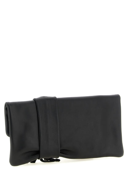 Evening Clutch Handbag by Jimmy Choo for women in lamb leather & satin black, gold, pink & floral showcases a sculptural silhouette, featuring a secure , ample , and versatile for a sculptural finish.