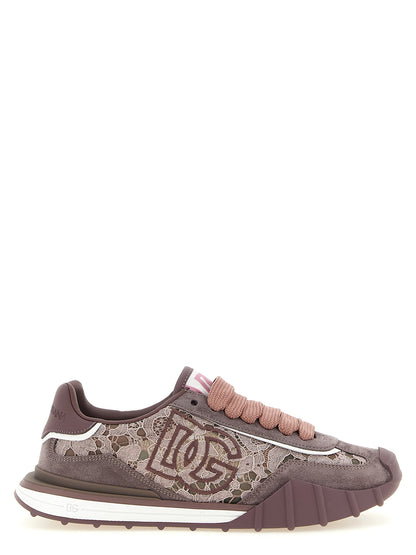 Athletic Sneakers by Dolce & Gabbana for women in tu viscose cotton & suede leather purple & floral features an effortless chic silhouette, showcasing the signature low-top style of the Women's Low Top TU Viscose Cotton & Suede Leather Athletic Sneakers collection with a truly effortless chic finish.